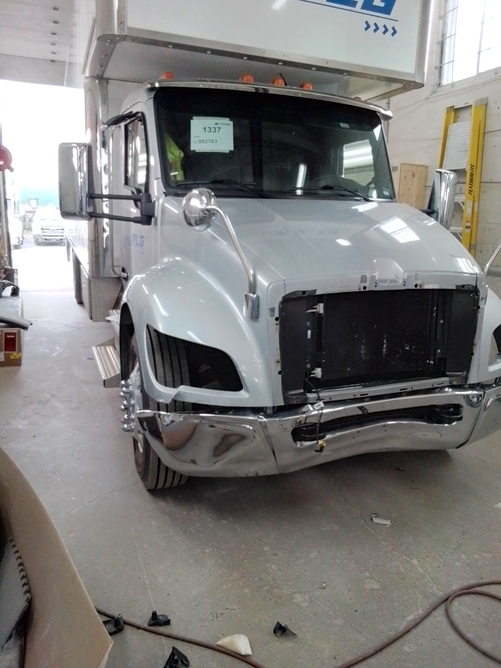 White truck to be repaired by J.B.Michor